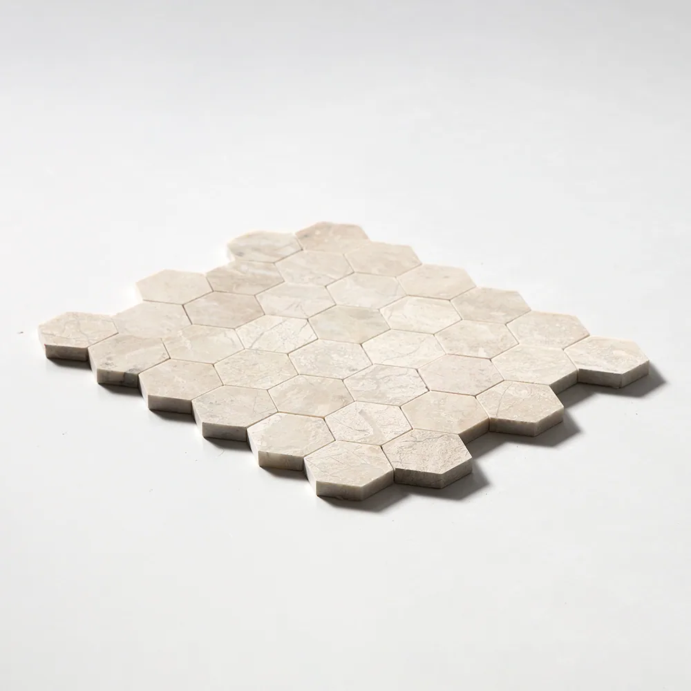 Two-inch hexagons of polished cream Diana Royal marble, the sheet tilted to show its scalloped edge and slight sheen.