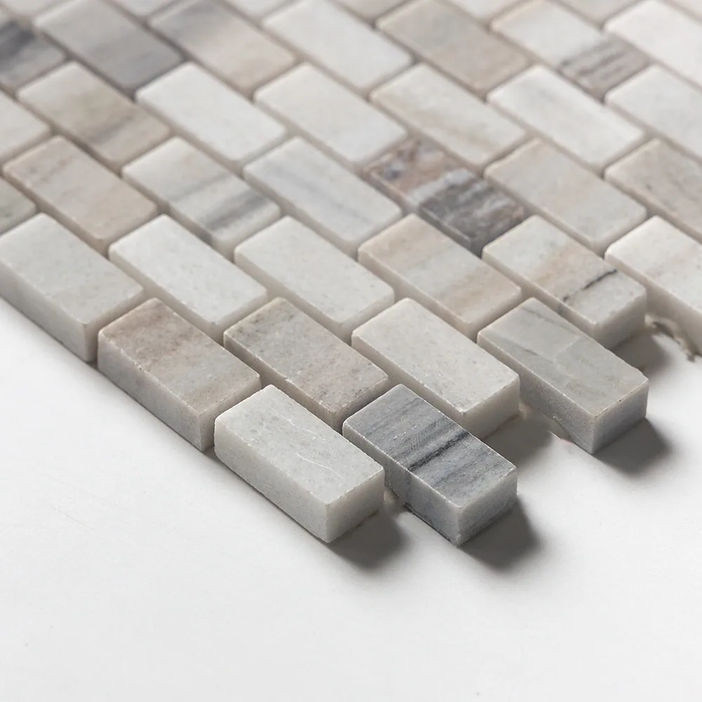 Close detail of the Verona chips, showing the polished faces, the sheet thickness and the grey and beige banding in the stone.