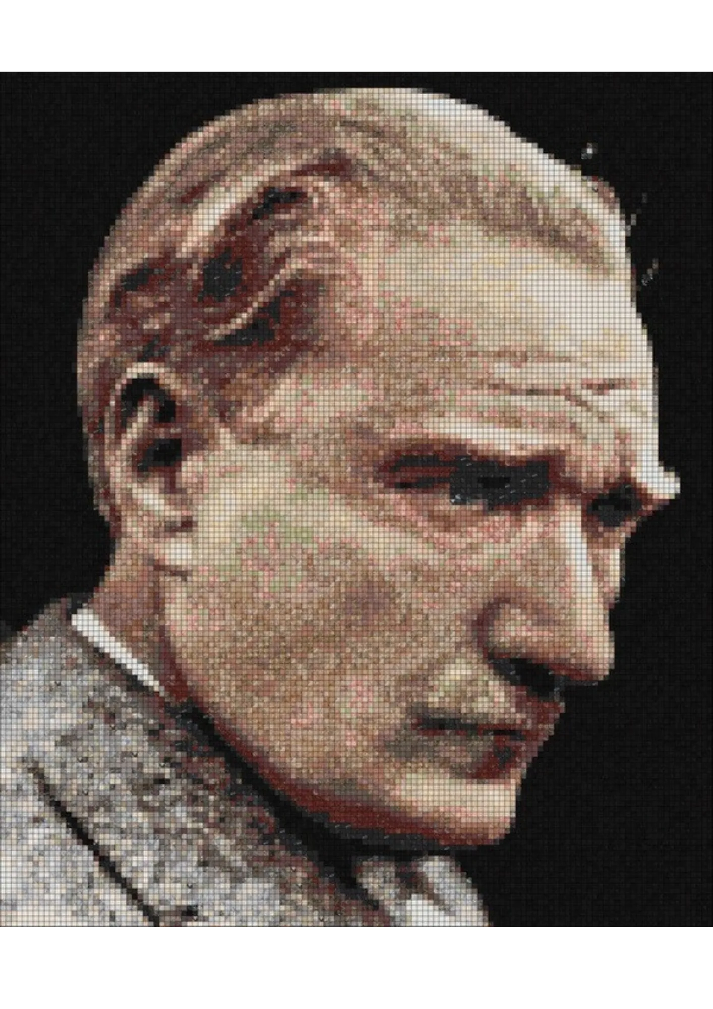 The full artwork as a mosaic simulation: a three-quarter portrait of Atatürk against a black ground, the face built from fine cream, rose and grey tesserae, with heavy shadow across the brow and a pale jacket and collar at the lower left.